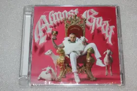 Smolasty siedzi na złotym tronie z kozami, trzymając kielich.